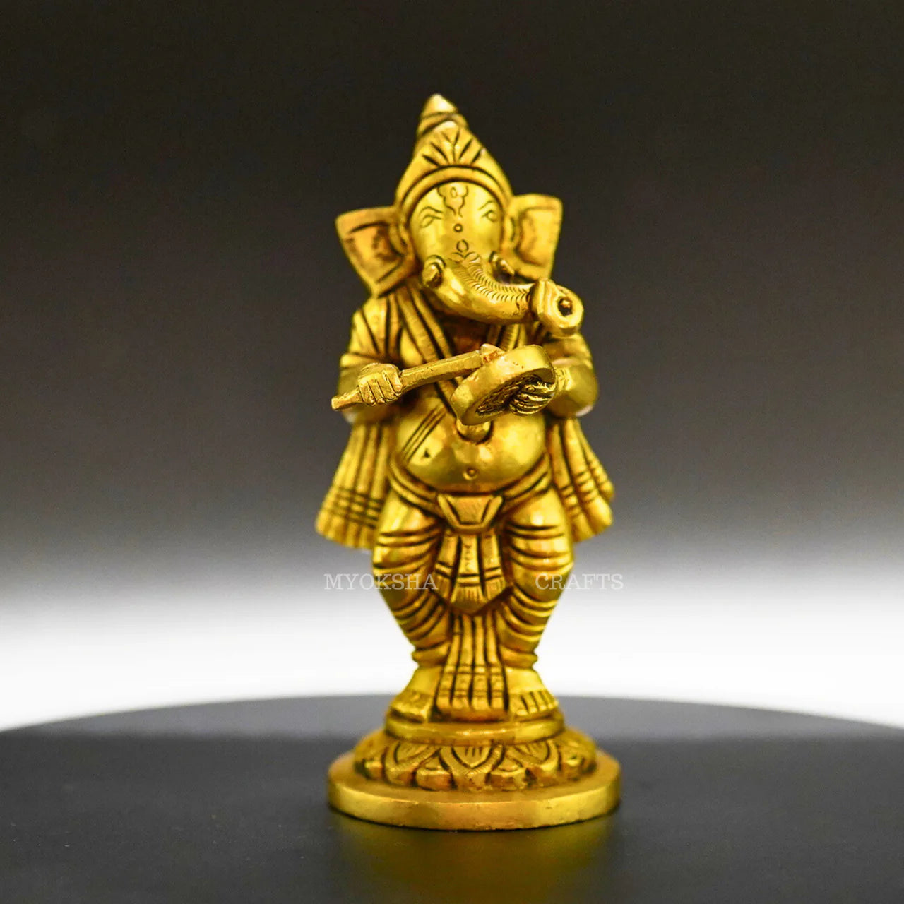 Ganesha Playing Gong Bell Brass Idol - Embrace Prosperity and Joy in Your Home Mytrendzcart